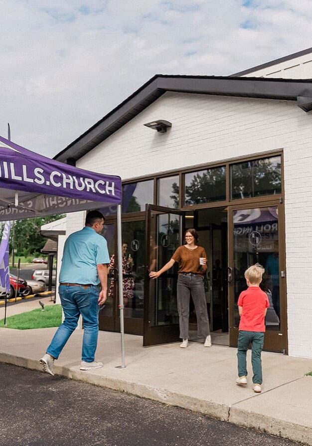 greeter-opening-door